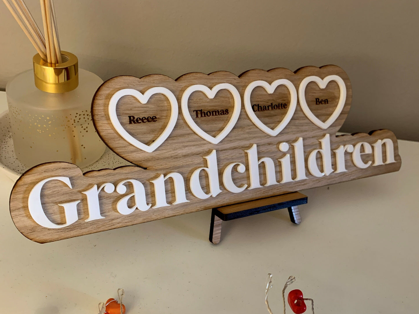 Grandchildren in Hearts Oak Sign